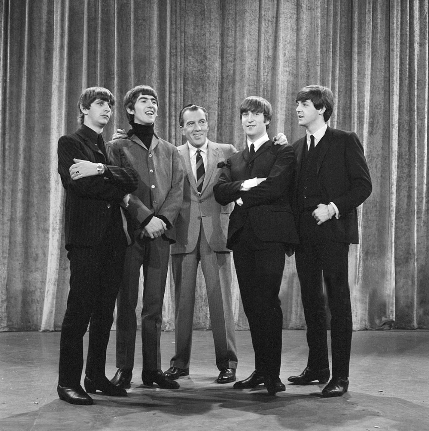 Photo of The Beatles with Ed Sullivan from their first appearance on The Ed Sullivan Show 